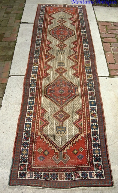 Serab--  2 ft 10 x 10 ft 3 in. Older circa 1900 piece on soft wool foundation-- The colors tell the story. Great looking piece. Well traveled. Even pile with Some  ...