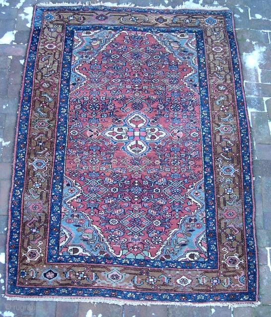 Hamadan. 4 ft 4 inches x 6 ft 5 inches. Good old sturdy west Persian village rug in nice thick condition. Unusual and attractive brown border w/ abrashes. Very decorative. There isn't  ...