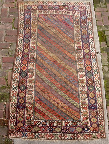 Kurdish 4 ft 1 inches by 8 ft. Bags are common but it is very unusual to find a large rug from this tribal group. Cool design and wonderful natural colors. Great  ...