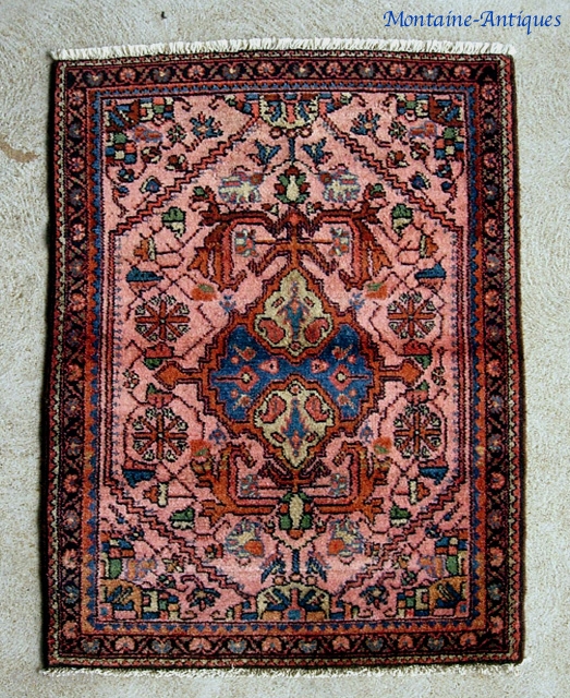 Lilihan-- 2 ft 9 by 4 ft 0 inches. Plush little rug with vibrant colors. The wool on this one is super soft and silky. Excellent near mint condition. Ends were secured  ...