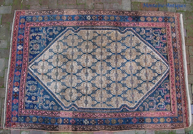 Good sturdy Kurd / Hamadan with nice camel medallion and great colors. 4 ft 4 inches by 6 ft 5 inches. Just the smallest bit of moth damage on one corner-- pretty  ...