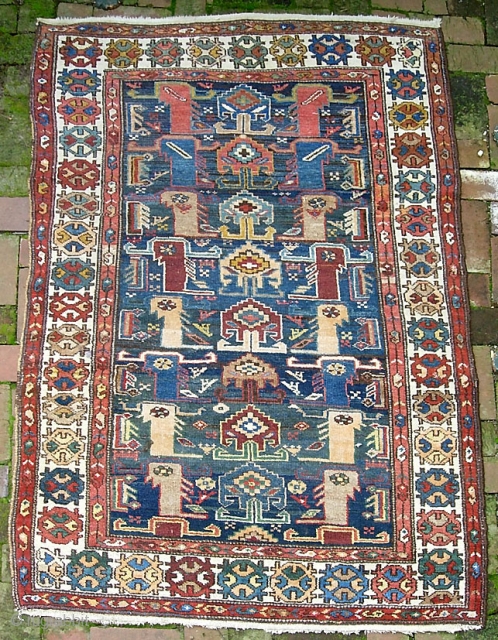 Bahktiari- 3 ft 7 inches by 5 ft 10 inches. Anything unusual is good-- and this is certainly unusual.  Motifs are hard to characterize but seem maybe Kurdish inspired. Nice soft  ...