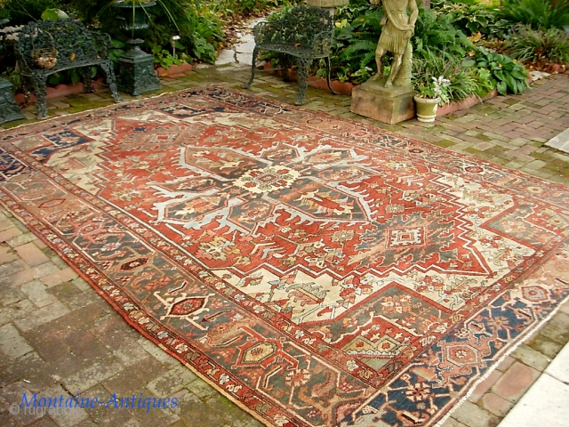 Serapi-- 8 ft 10 in x 12 ft 3 in. A legit antique rug, probably 19th century. It is very open and the medallion is proportionally huge.  Very interesting design and  ...