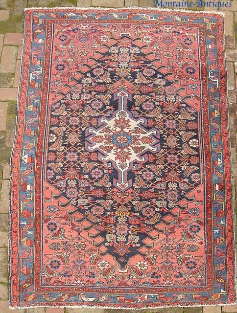 Hamadan. 4 ft 3 inches by 6 ft 8 inches.

Finely balanced medallion with really nice salmon corners. All natural dyes on this one. Decorative old piece that would look great with period  ...