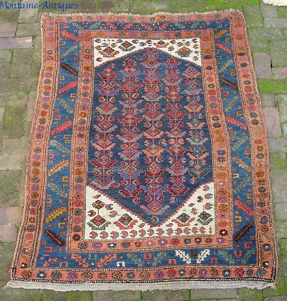 Kurd on wool foundation. 3 ft 10 by 6 ft. Even wear with a bit of weft showing here and there.            