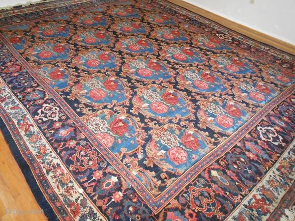 Fresh from an estate: A 1920's High Quality Bijar, size is 11'2"x14', thick pile, has damage at one end, not too costly to repair.  Thanks for looking.     