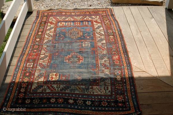 Fresh from an estate sale:  Late 1800's Caucausian rug that needs lots of work.  Size is 45"x77".....make me an offer.           