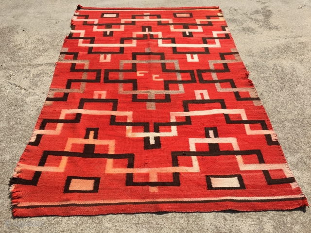 1890-1910 Navajo Transitional Blanket measuring 57"x 83" with minor loss to 4 small area's along the sides: I feature the worse in the third picture.  Rug has bleeding.  No animal  ...