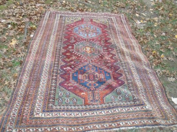 As found: An early 20th century Tribal rug measuring 5'x 7' in good condition, light even wear.  Thanks for looking.            