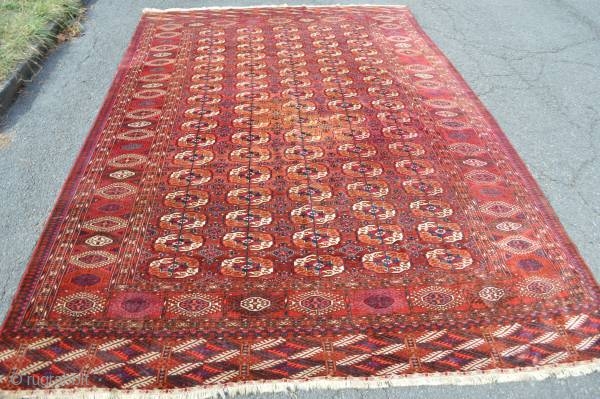 As found: An early 20th century Turkoman carpet measuring 7'5"x 11'4", light even wear, couple of old repairs that are hard to notice, and an area with some discoloration.  Thanks for  ...