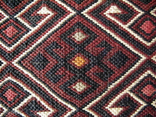 EAST ANATOLIA, Shavak Kurdish tribe baby carrier. Very similar to the one in John Thompson's Carpet Magic book (last page).Sumak weave with natural colors. circa 1900 - 1920. size: 15" x 31"  ...