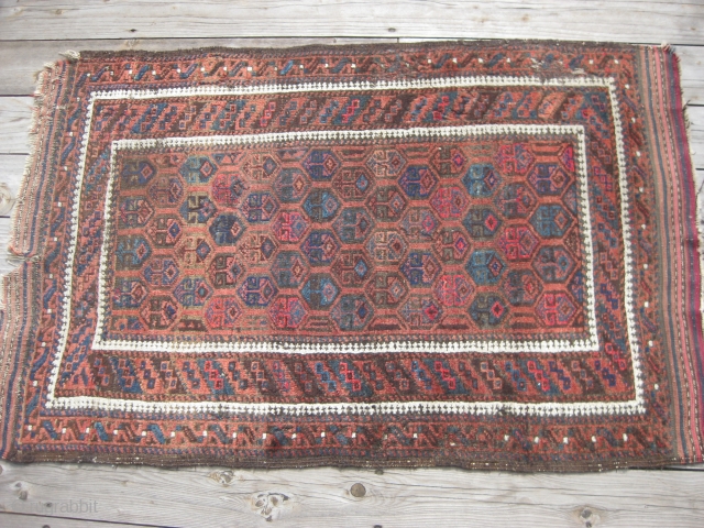 Late 19th C Balouch. Good pile and colors,retains kilim ends. Area of about 2" of moth damage near upper left. 51" X 33". Lower photo is reverse side.     