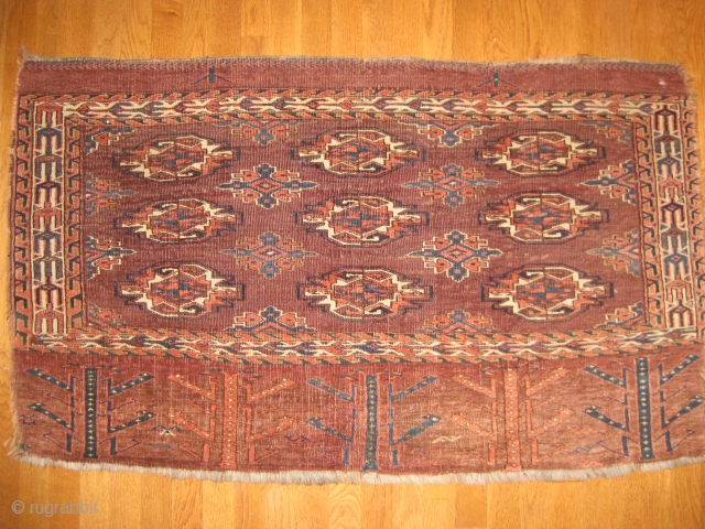 Antique Yomud chuval, 19th C. w/soft medium pile.  Missing side cords but good overall condition. Unique alem motif. Size 4'4"X 2'7"           