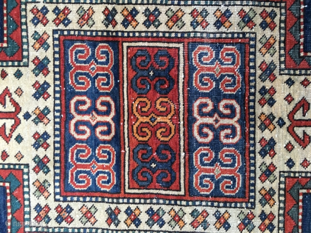 Antique Sewan Kazak Rug. Early 20th Century, 1910-1920. Lovely all organic colors including a natural orange and nice greens and blues. Original side cords and ends. Size 88"X 45"/223 X 114cm. Good  ...