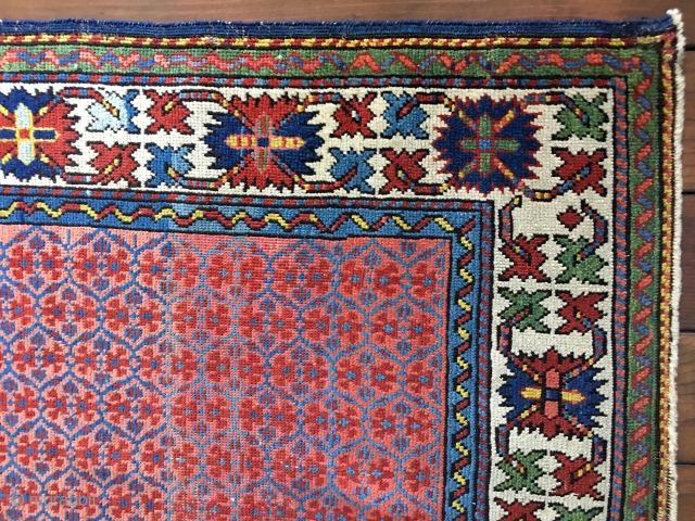 Antique Caucasian Kuba rug circa 1890. Very good condition. All natural saturated colors including yellow, a brilliant green and bright blues Medium/low to near full pile. Nice abrash in field. Original selvedges.  ...
