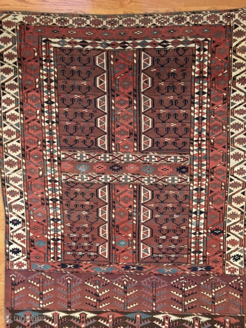 Antique Yomut Engsi from circa 1875. All natural dyes including a saturated blue and generous use of aubergine. Excellent condition with very good pile throughout. Two minor slightly detectable repiled spots at  ...