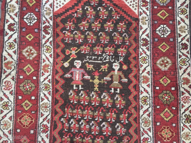 Antique Persian Bidjar runner with a lovelyl couple of Kurdish village people, signed and dated. Wool on wool foundation, size: 365x100cm / 12ft x 3'3''ft , little old moth damage at the  ...