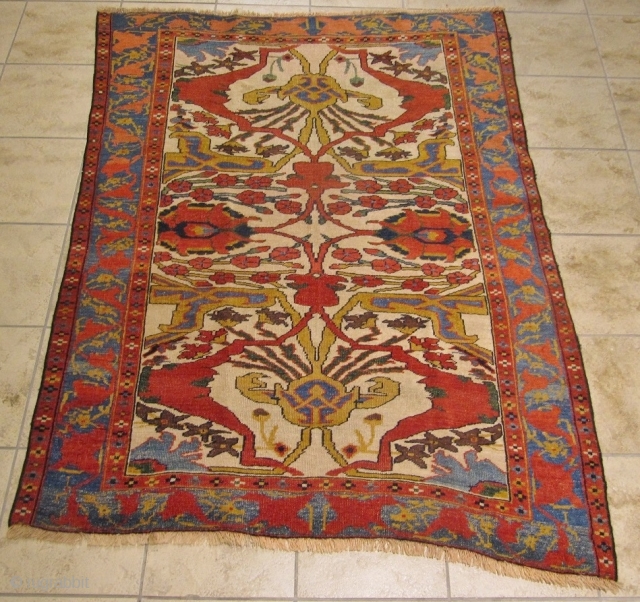 a very beautiful Gerus Bidjar rug with great colors and archaic drawing. Age: circa 1870. Size:ca.170x130cm / 5'6''x4'3''ft www.najib.de

Like us on Facebook: Najib Gallery         