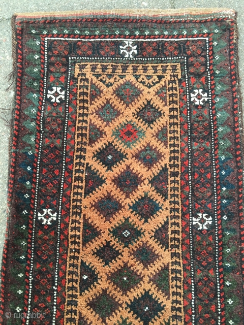 Antique camel ground collector´s Baluch balisht, glossy wool and cool graphics, nice collector´s item. Size: 86x41cm / 2'8''ft x 1'3''ft all natural colors. 
         