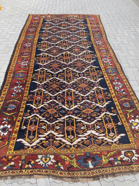 Antique Persian Bakhtiary village rug from the 19th century, wool foundation, beautiful natural colors. size: 405x190cm / 13'3''ft x 6'3''ft             