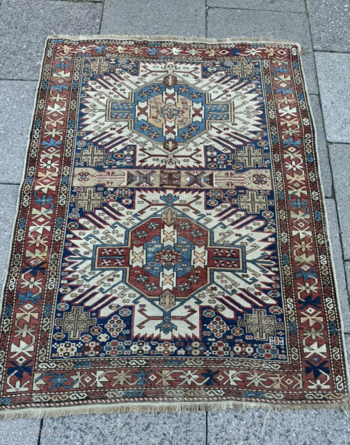 Antique Caucasian Zeywa / Zejwa rug from the East-Caucasus. Beautiful design with 2 large sunburst medallions. Light overall wear and minor corner damage. Size circa 150x117cm / 5‘ft by 3’9ft http://www.najib.de  