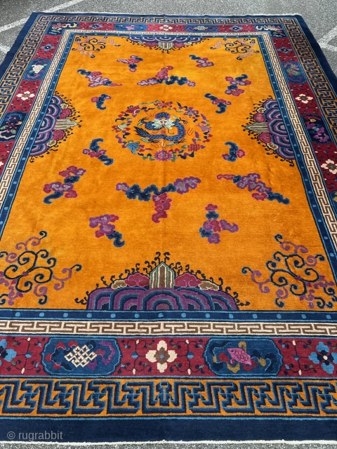 Very decorative antique Chinese carpet, beautiful tangerine field color. Size: ca. 415x320cm / 13’6ft by 10’5ft http://www.najib.de                