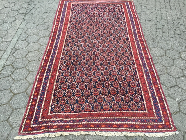 Large antique Afshar tribal rug from Southpersia with a very well drawn Boteh field pattern. Wool foundation, good quality. Size: ca. 305x165cm / 10ft x 5'5''ft some light wear, otherwise good overall  ...