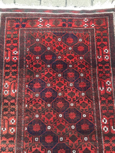 Looking for a christmas gift? a charming antique Baluch rug, beautiful design of diagonal stripes with memling gul separated by boxes of white rossettes. size: ca. 200x97cm / 6'5''ft x 3'2''ft  