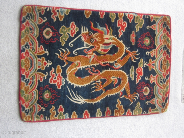 Tibetan, saddle top, with original straps on the back, very very finely woven, mid-20th C 23 by 32 inches              