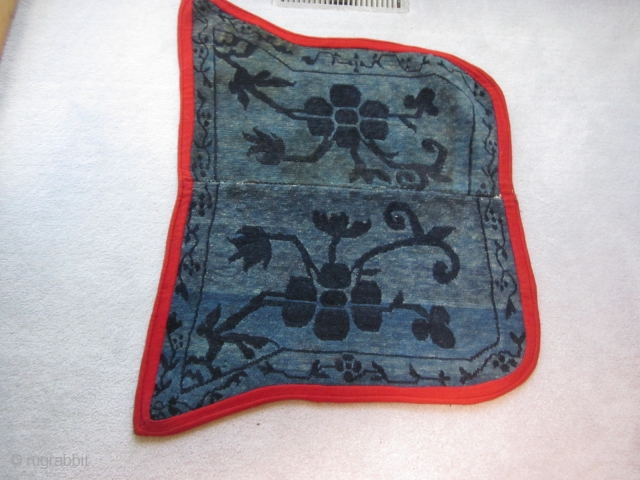 Tibetan butterfly saddle bottom. Exercise in blues with very figurative single.Spacing center strip removed to fit an animal of smaller girth.            