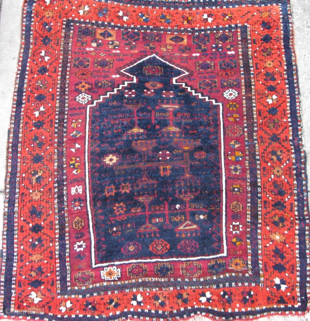 Anatolian Kurdish prayer rug circa 1890. 3'10" x 4'7"  A couple of small old repairs. The blue and orange colors are in thick full pile while the purple color is lower.  ...