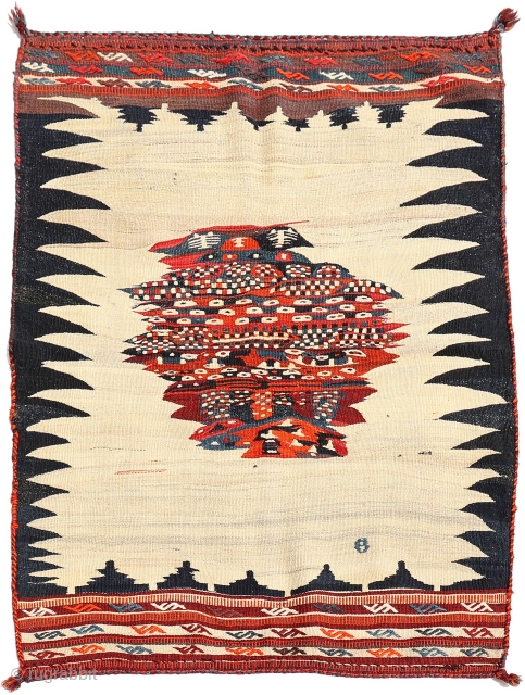 One of a kind Paul Klee looking Qashqai sofreh. You can buy this very unusual sofreh directly from our web: https://nomada.biz/en/producto/semi-antique-qashqai-sofreh-kilim-from-iran-159x120-cms/            