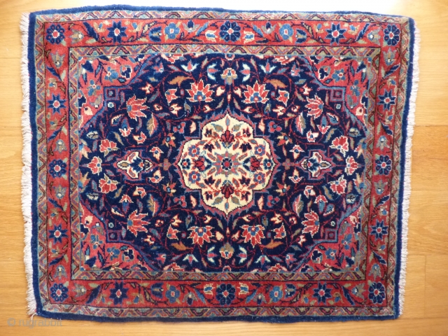 Kashan pushti, 77x57cms, tightly woven, well drawn, floral piece, very good condition with one small area of damaged low pile to one corner (see photo, recently washed with good result.   