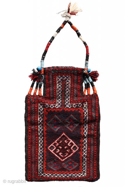 A Bakhtiari salt bag woven with the soumak technique. Some blue ceramic beads have been added as protection against evil eye. Natural dyes.

You can buy this salt bag directly from our web:  ...