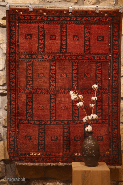 An antique Ersari Turkman squarish rug. This rug is woven with an unusual design of square compartments, each square having a set of leaves dividing the squares. The rug has some interesting  ...