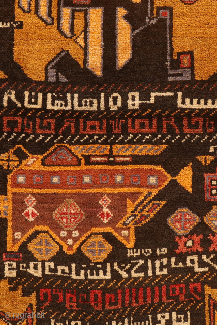 A one of a kind vintage war rug with a huge tank as the central motif. In the field airplanes, guns and granades can be found. There is plenty of writing throught  ...