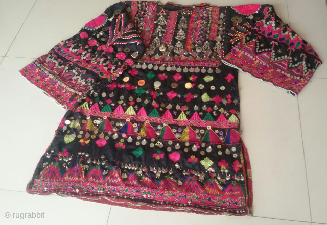 Tribal Jumlo dress from Kohistan valley woman 
Very finely hand embroidered and decorated with coins and jewellery 
Email: nooristanartgallery@yahoo.com 
             