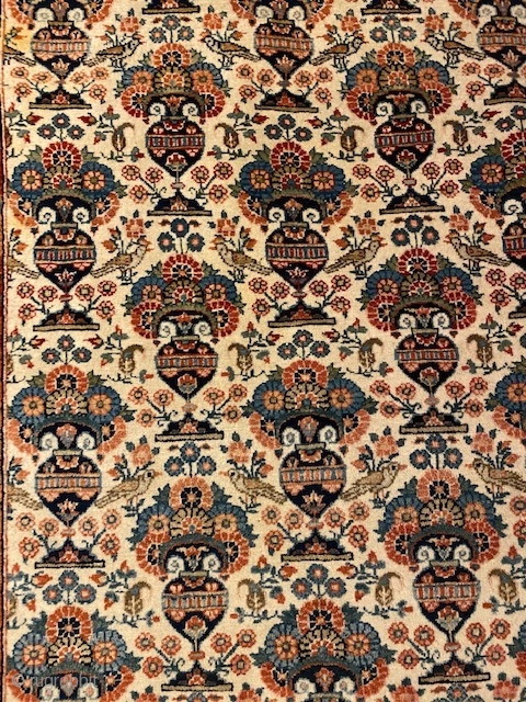 Semi- Antique persian carpet finely knotted in Zil-E-Sultan pattern with a bright ivory background. 3x2 meters.

Pull pile with some minor wear on the sides.  Highly decorative. 

     