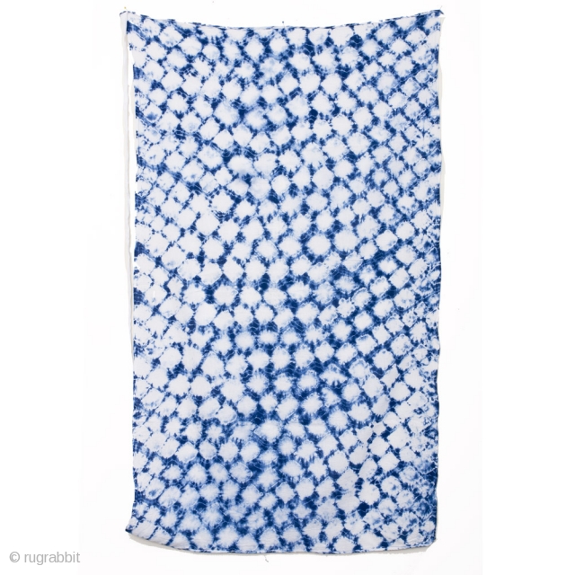 This a large swath of Japanese shibori cotton. Shibori is a Japanese term for several methods of dying cloth with a pattern by binding, stitching, folding, twisting, compressing, or capping. A simple  ...