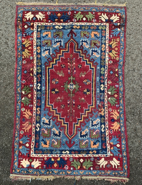 Antique Rabat rug. 19th century.165x103cm. A lovely colourful older example. Some wear and a small hole in the field.              