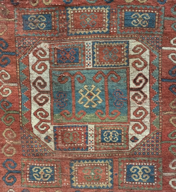 Beautiful 19th century karachop kazak rug. Heavy wear around the edges but lovely colours and at a fraction of the cost of a full pile example.       