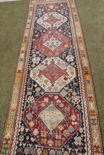Old caucasian rug- Akstafa ?
Unusual size : 250*85
Nice design , overall good condition
P.cat
                    