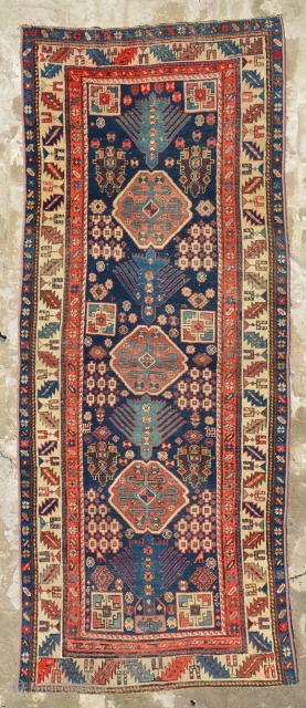 An Antique Caucaian runner (karabagh) late 19th century or 1st half of 20th century, red is fast and when I washed that the red runs on other colors.
size is 270 x 110  ...