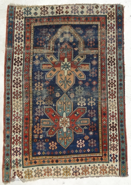 A small caucasian prayer rug

size is 130 x 90                        