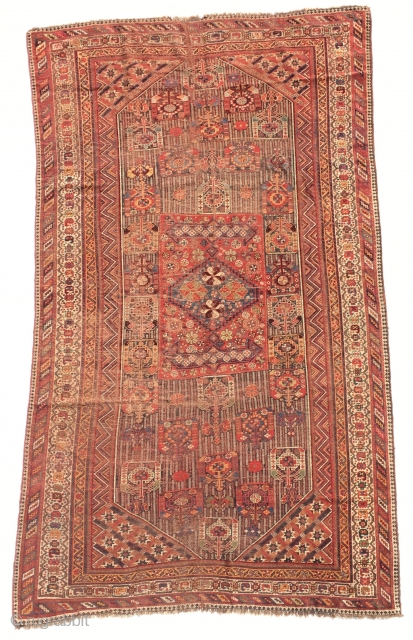 19th  Century khamseh rug. Too much worn but still charming. It's size is  295 x 170 cm              