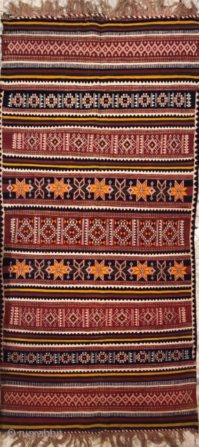 Durrie handwoven of cotton with vibrant colours with geometrical design all over from Thar desert region of Rajasthan India.the durrie is in very find condition without any holes or stains.the size of  ...