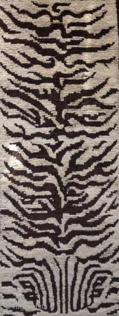 rare and nice drawn tiger skin design rug. the white and brown is undyed wool. this is not a tibetan weaving but it was made for a tibetan monastery. condition is good  ...