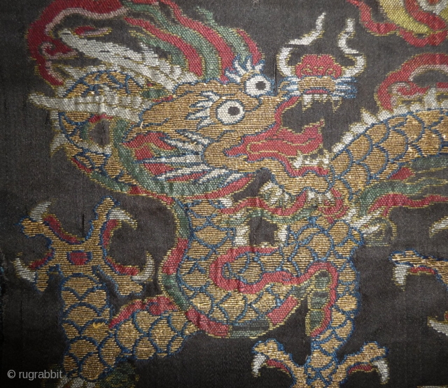 nice small silk brocade fragment from probably a formal court coat. the gold-wrapped threads are mostly in good condition. china around 1700. 34x 17cm         
