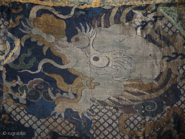 rarely has a brocade the look of a kesi (tapestry weave). beautifull  fragment of a 17th century silk brocade. wonderfull drawing and palette. tibetan patchwork but originally possibly part of a  ...