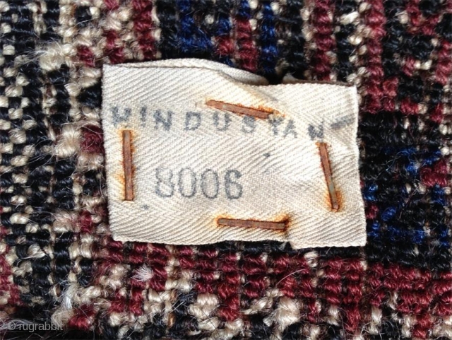 antique baluch with its original british empire export tag. wonderful camel ground with all natural colours including very nice blue on super soft and fine wool. selvedge damaged in places but otherwise  ...